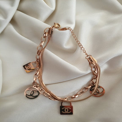 Double layered Chain bracelet with multi charms.