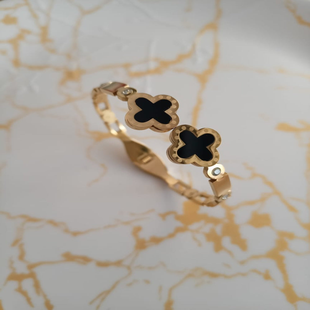 Golden black clover anti tarnish kada. Sleek design with front open.