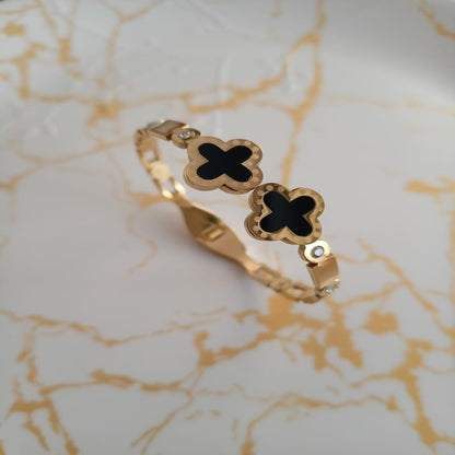 Golden black clover anti tarnish kada. Sleek design with front open.